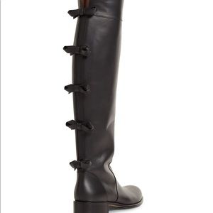 Valentino leather bow riding books